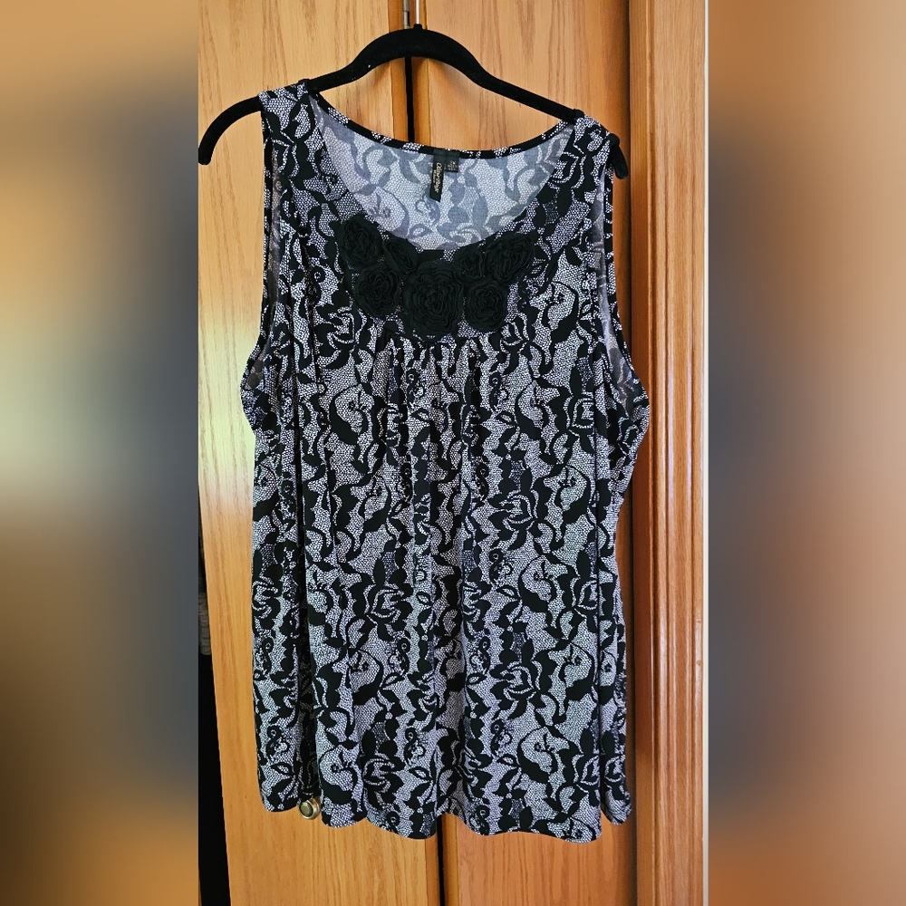 2x tank.  Great by itself or under a cardigan.